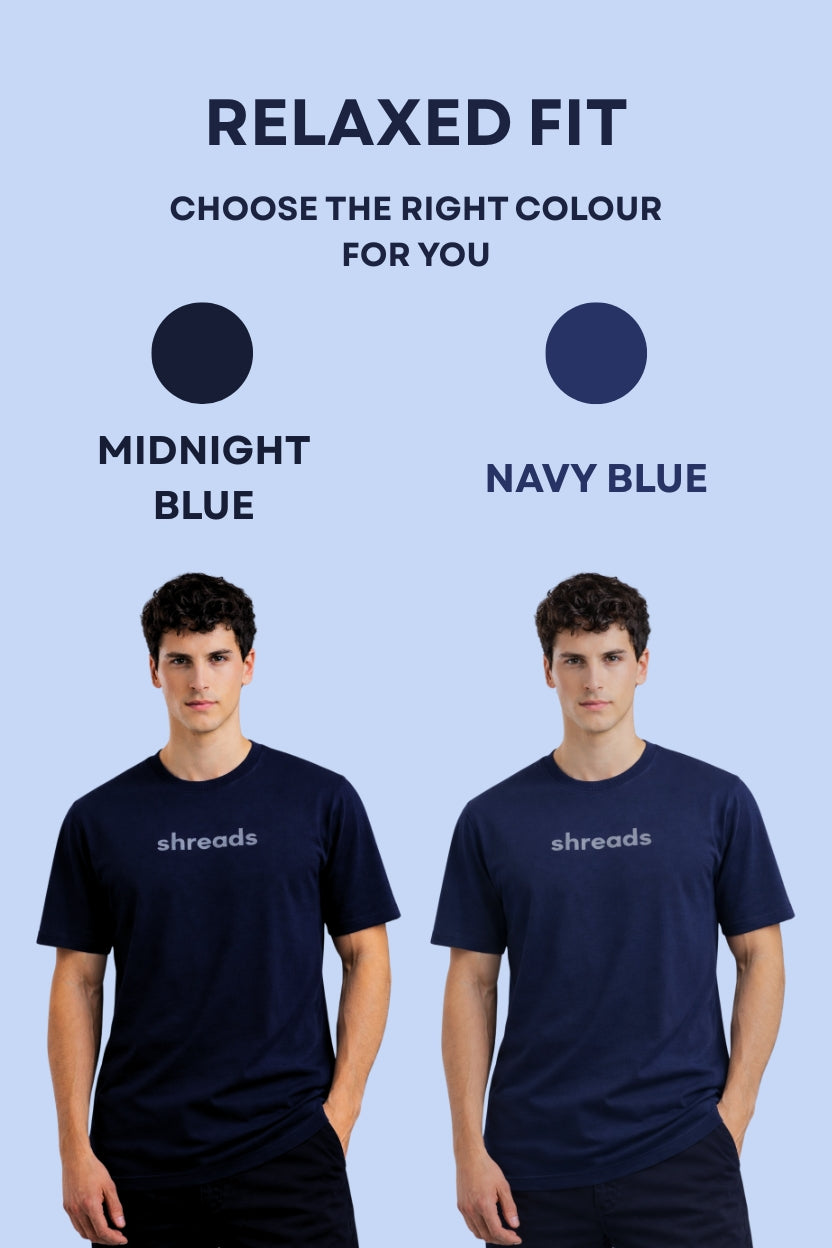 Two men wearing relaxed fit navy blue t-shirts with 'shreads' logo on a light blue background, choosing between Midnight Blue and Navy Blue.
This is a tshirt by shreads shreadslife shredlife shred life shread